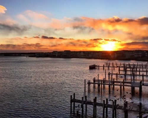 Image of a Sunset over the Ocean at Panini Bay Restaurant in Tuckerton NJ